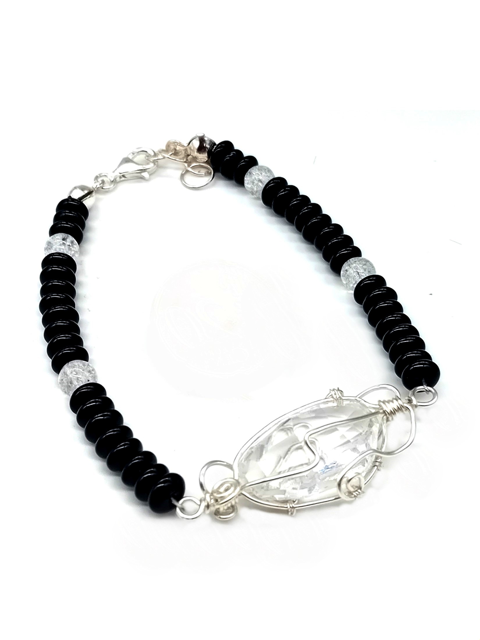 Armband aus Obsidian und Bergkristallperlen und Swarovski Stein 925 Silber